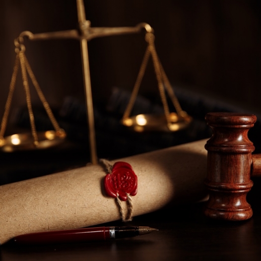 Justice gavel and Last Will and Testament document on wooden table